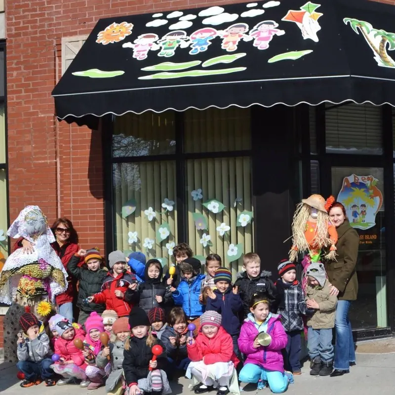 Group photo of children outside Fantasy Island Schools