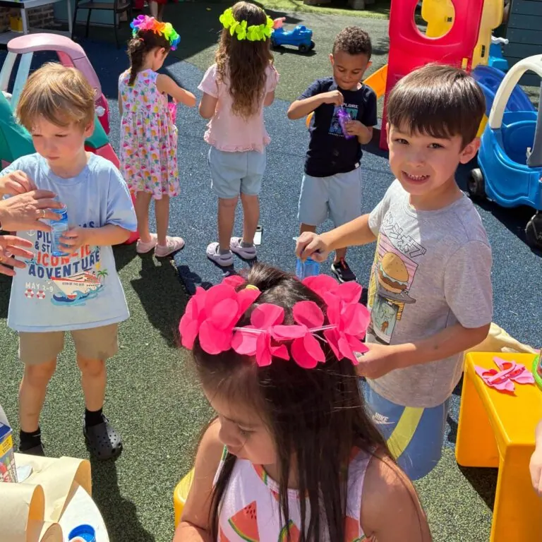 Kids playing together on the outdoor playground at Fantasy Island