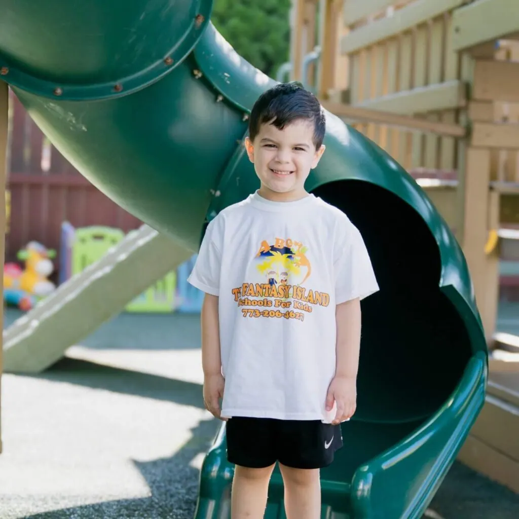 Child on the playground at Fantasy Island, 6100 N Milwaukee Ave, Chicago