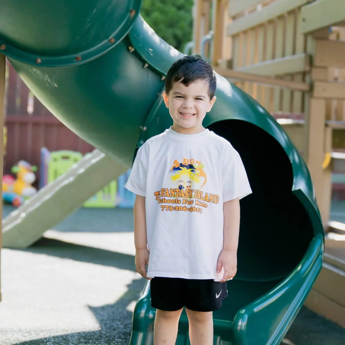 Child on the playground at Fantasy Island, 6100 N Milwaukee Ave, Chicago