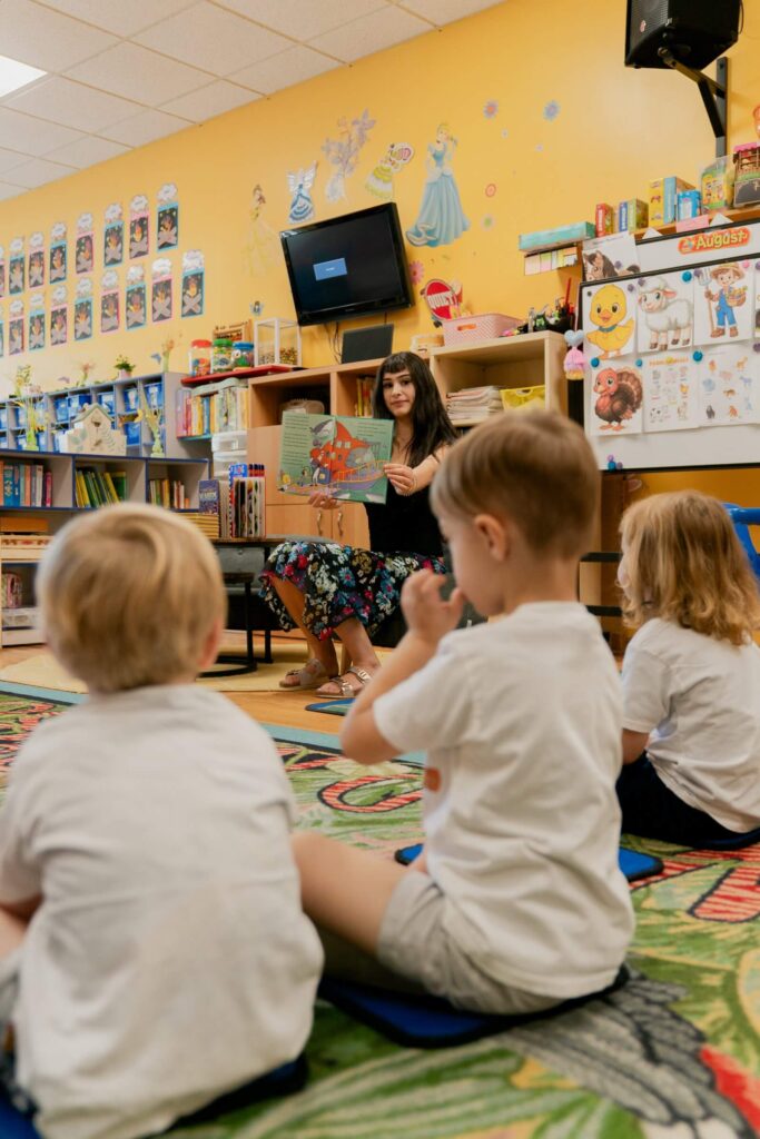 Teacher with a group of children at Fantasy Island daycare near Gladstone Park